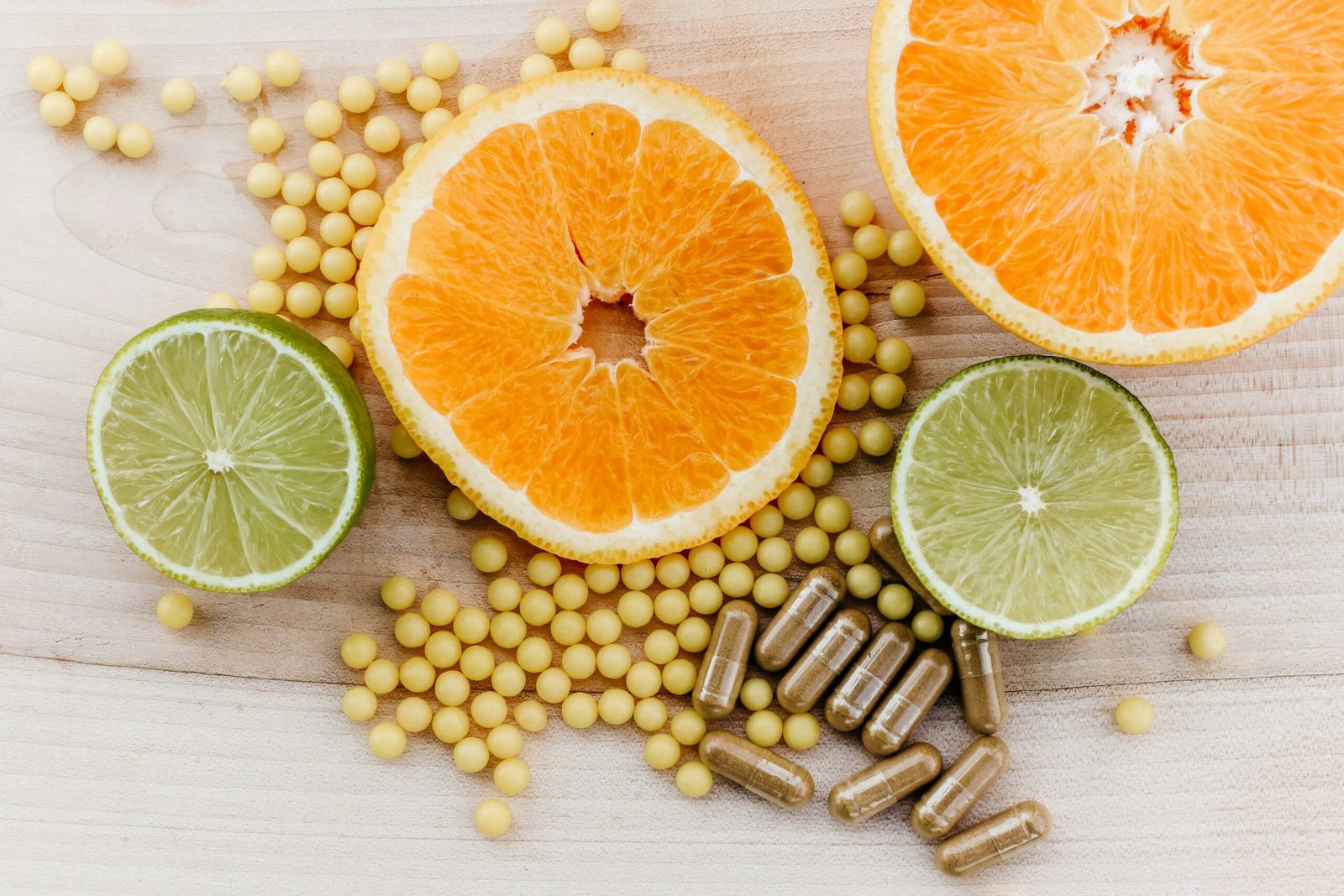 Gut health pills with a orange and a lime