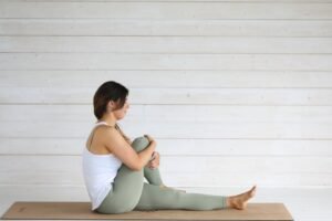 Woman struggles with pelvic floor dyssynergia.